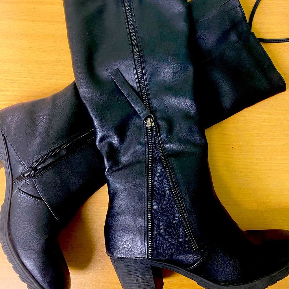 My loss, your gain. Black heeled boots.